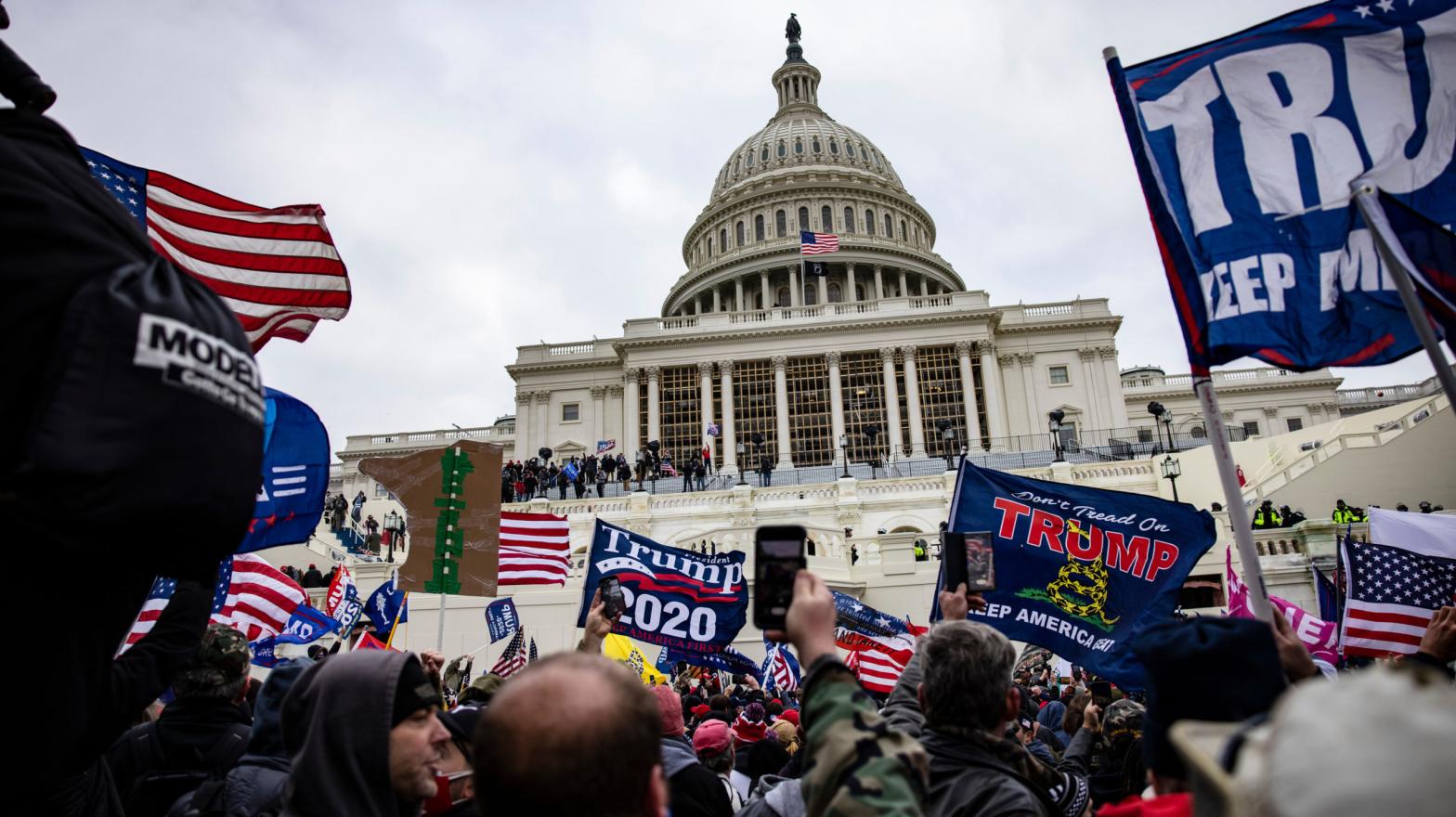Pro-Trump insurgents storm the U.S. Capitol following a rally with President Donald Trump on January 6, 2021 in Washington, D.C.  (Photo: Samuel Corum, Getty Images)