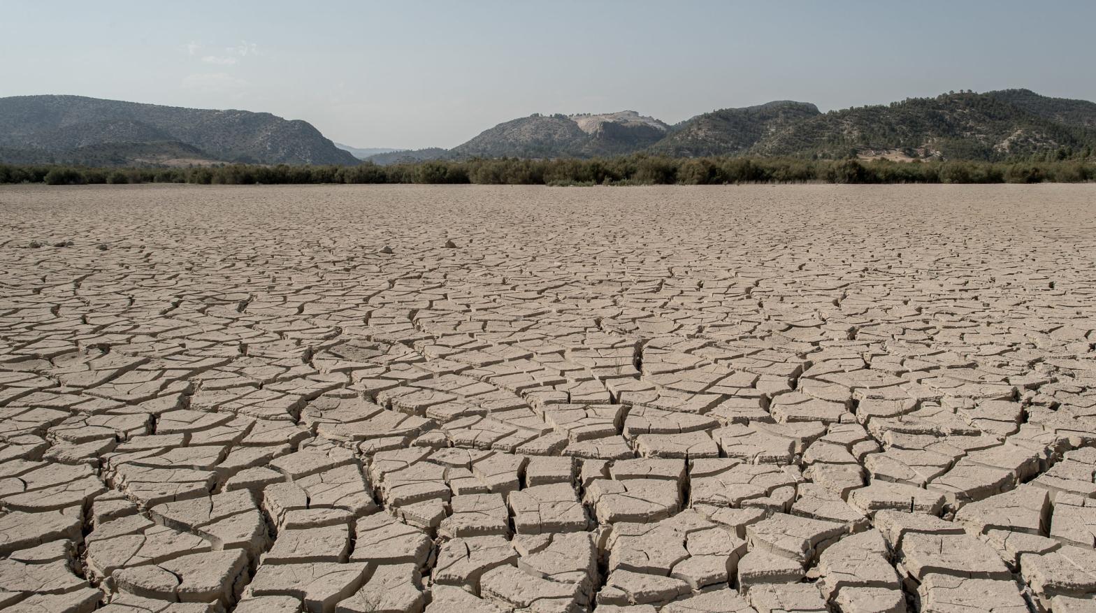 Dried cracked mud is seen at the Valdeinfierno Reservoir in Zarcilla de Ramos, Spain. (Photo: David Ramos, Getty Images)