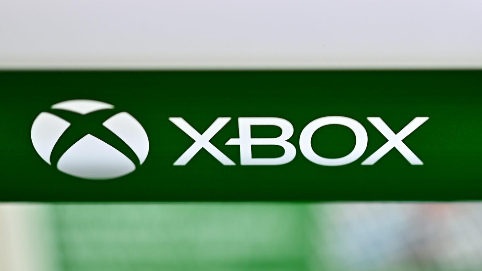 Microsoft's Xbox logo is seen during the worldwide release of the Xbox Series X gaming console at an electronics store in Tokyo on November 10, 2020.  (Photo: Charly Triballeau / AFP, Getty Images)