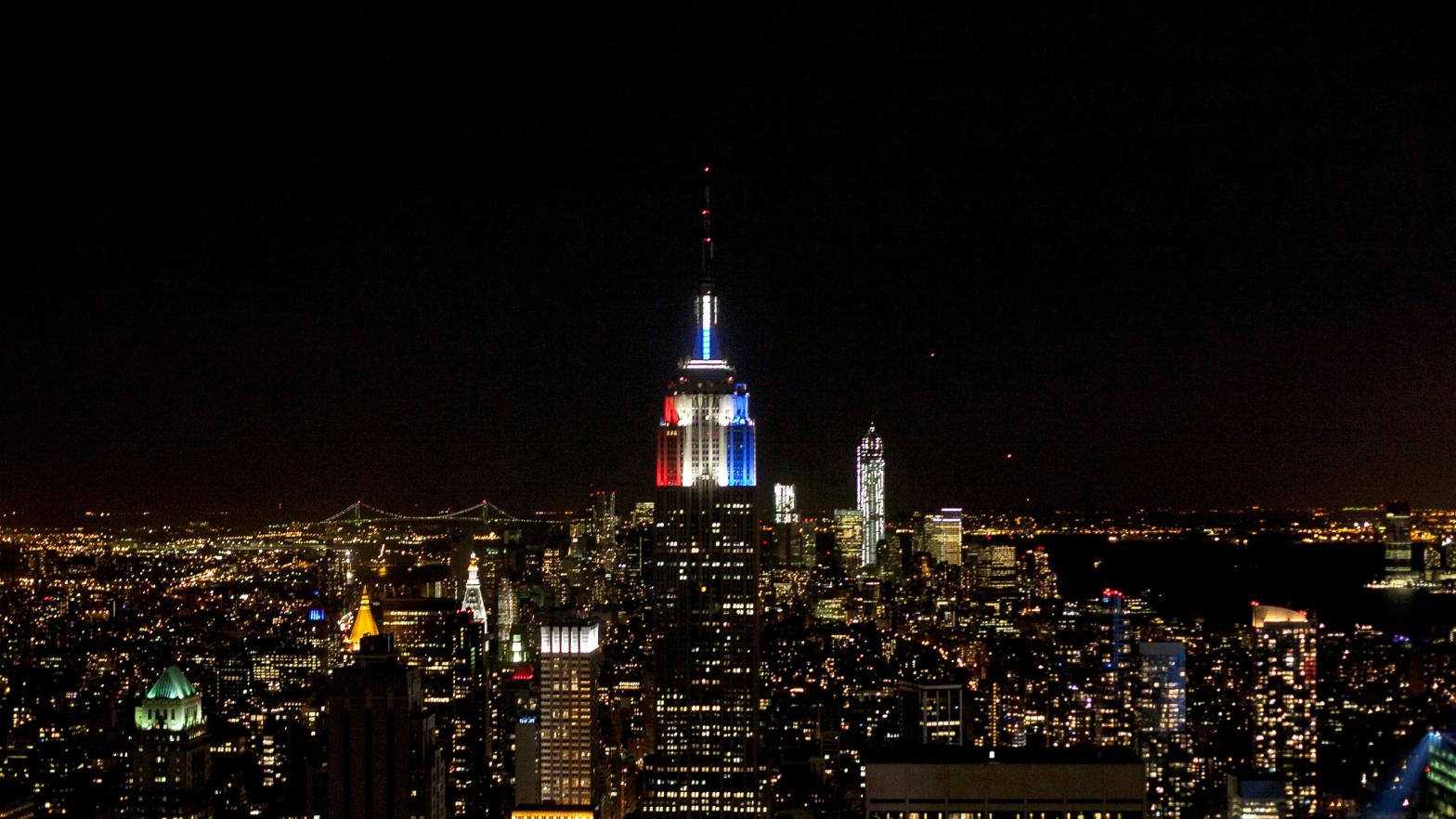 The Empire State Building is lit red, white, and blue. (Photo: Allison Joyce, Getty Images)