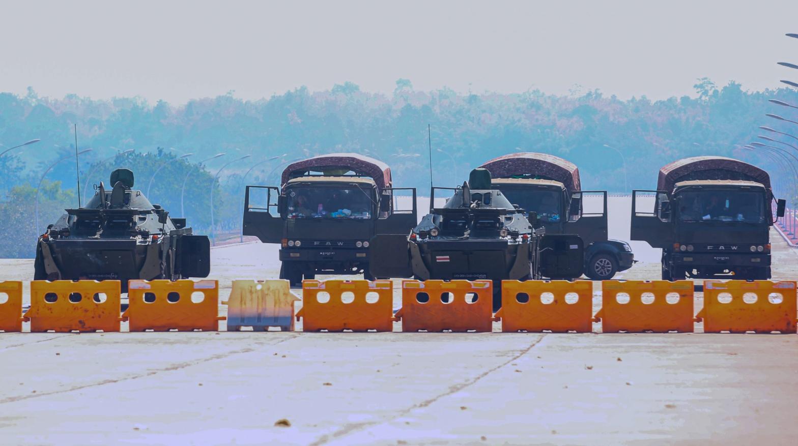 Military vehicles take position on a blockaded road near Myanmar's Parliament in Naypyidaw on February 4, 2021.  (Photo: STR/AFP, Getty Images)