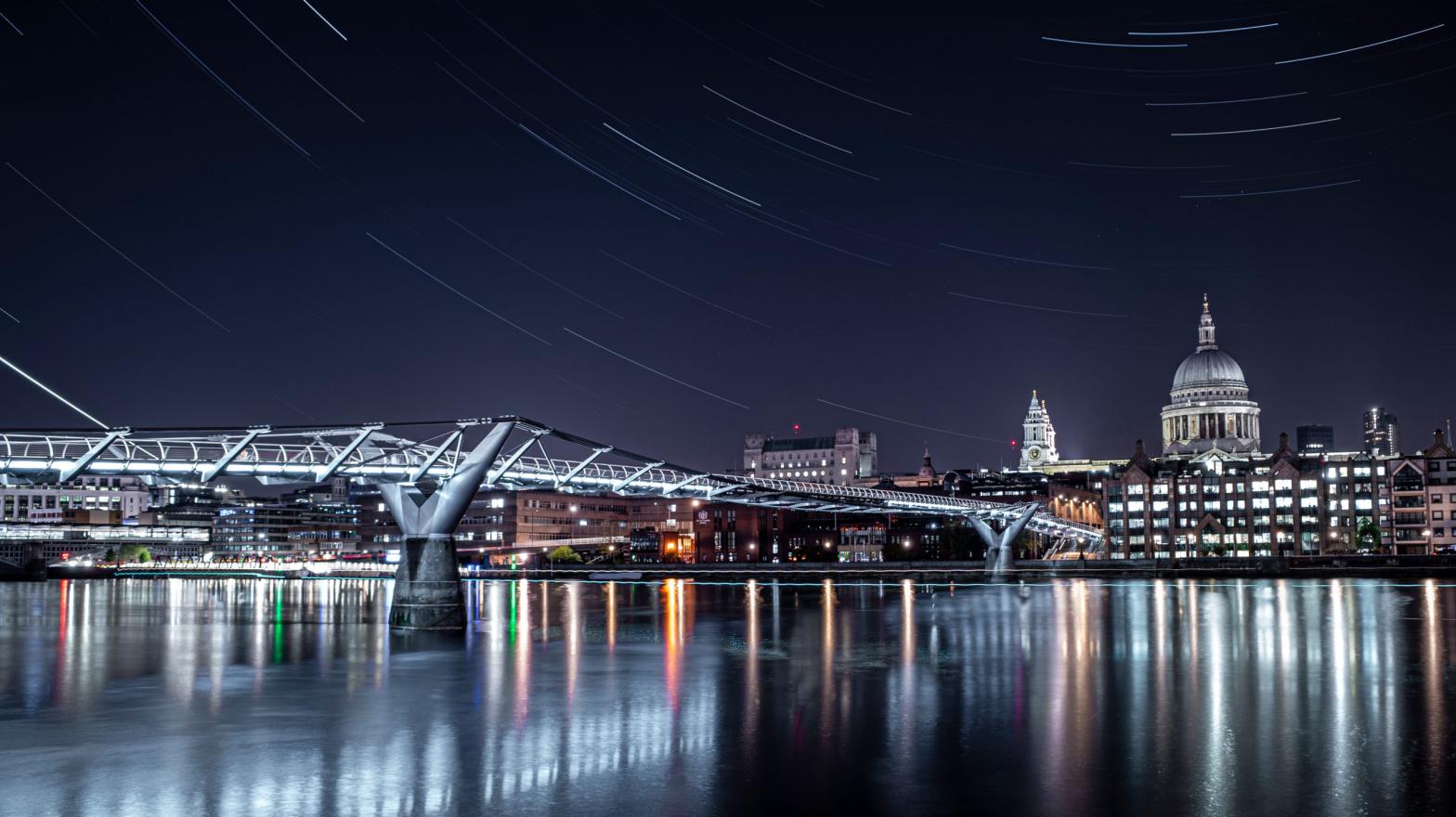 In this multi-exposure picture, the London Millennium Footbridge is illuminated under the stars on a clear night on April 21, 2020 in London. The clear skies created by the new moon coincide with the Lyrid meteor shower, an annual display caused by the Earth passing through a cloud of debris from a comet called C/186 Thatcher. (Photo: Simon Robling, Getty Images)
