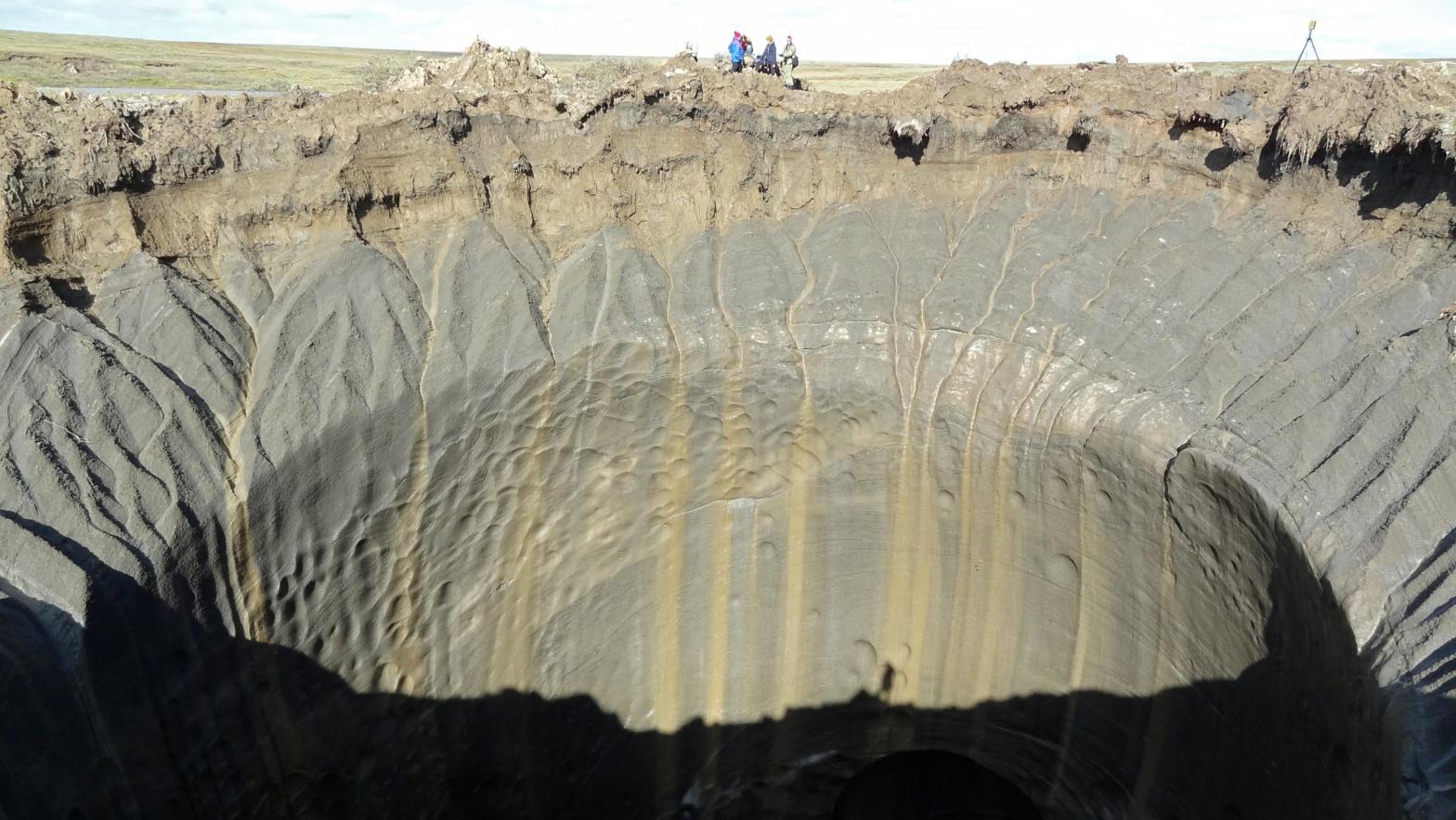 A photo taken on August 25, 2014 shows a crater on the Yamal Peninsula, northern Siberia. (Photo: Vasily Bogoyavlensky, Getty Images)