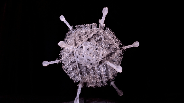 This Glass Sculpture of the AstraZeneca Coronavirus Vaccine Is 1 Million Times Larger Than the Real Thing