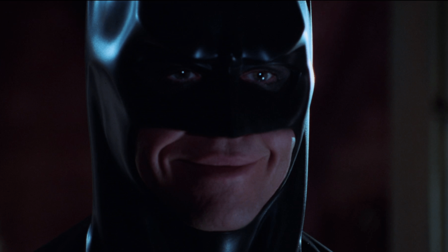 Batman, upon learning Dr. Chase Meridien has become horny for Bruce Wayne. Seriously, (Screenshot: Warner Bros.)