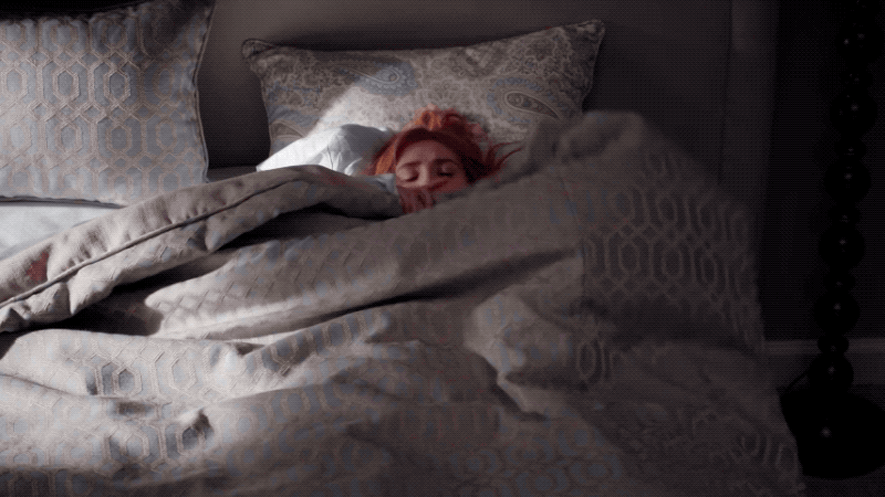 Wanda waking up to realise she fell asleep in her clothes from the other night. (Gif: Disney+/Marvel)