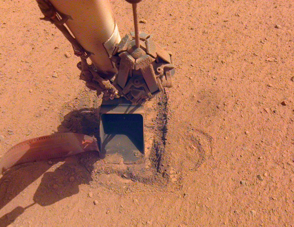 The InSight lander's heat probe just wouldn't stay buried. (Gif: NASA/JPL-Caltech)