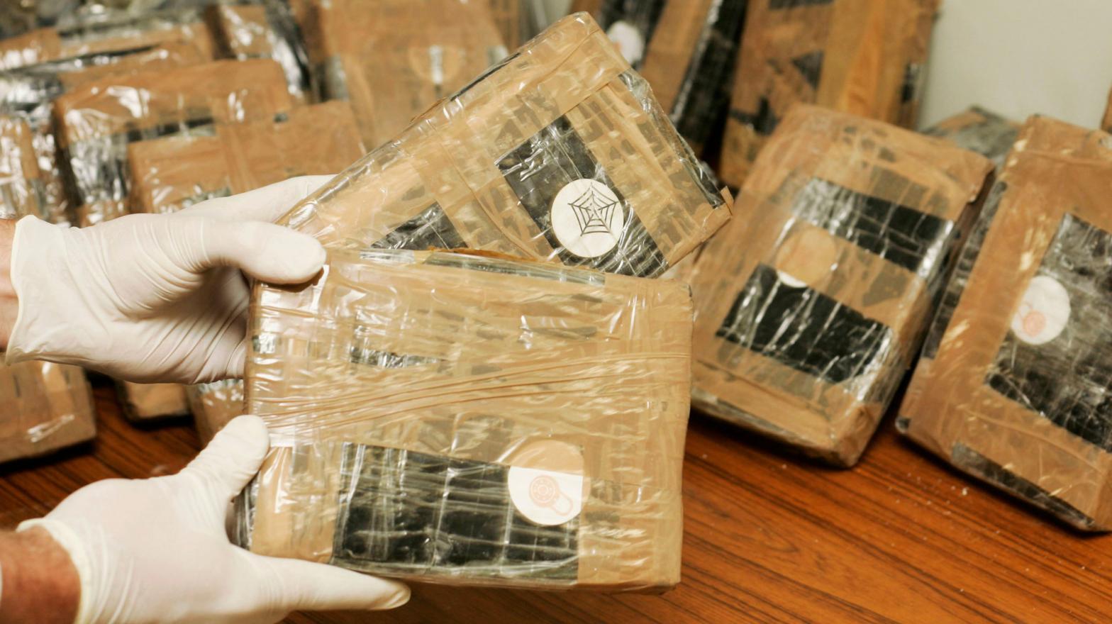 Belgian federal police handling seized cocaine in Brussels in April 2007; stock photo. (Photo: Mark Renders, Getty Images)