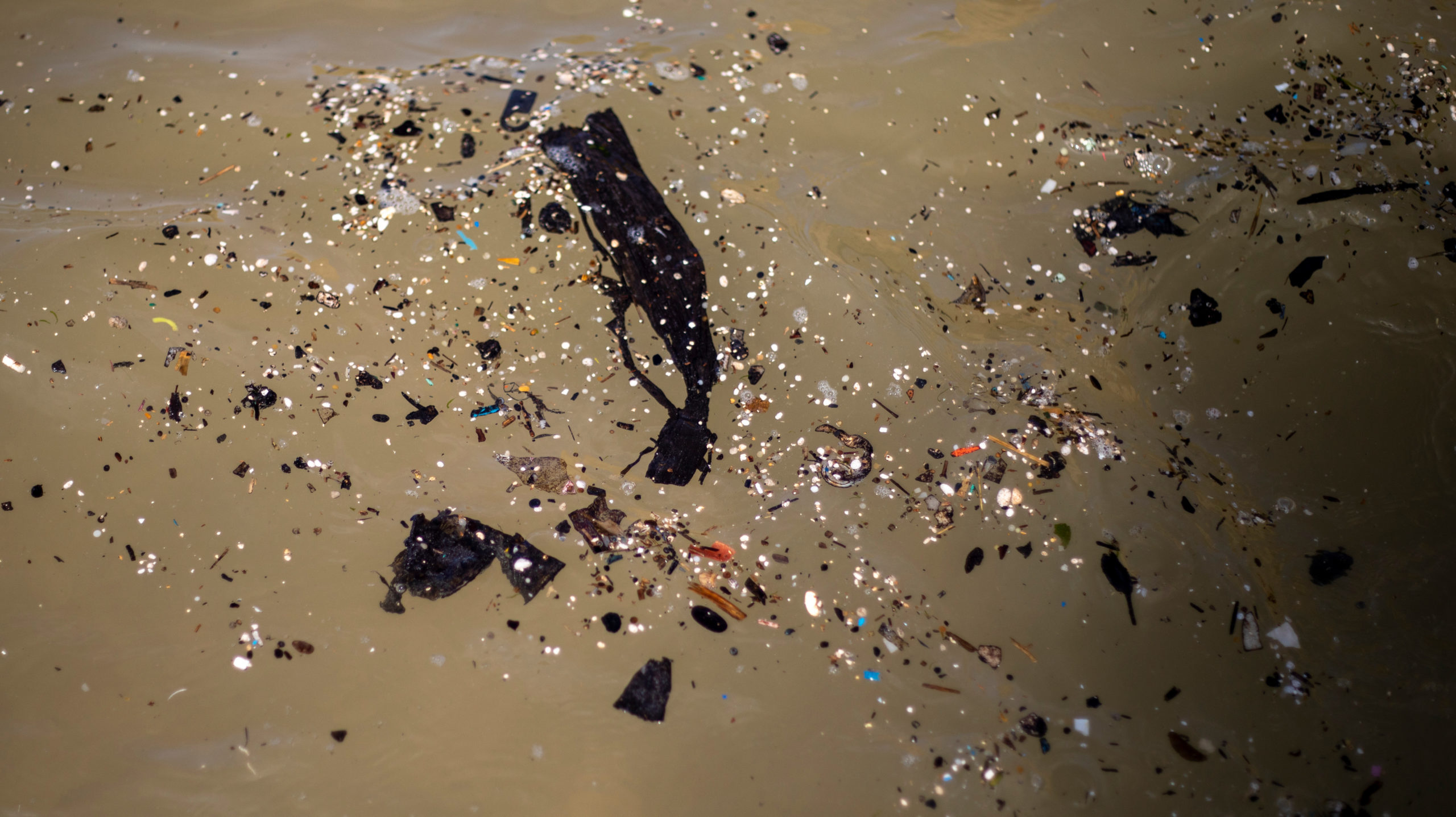 Tar pieces, trash, from an oil spill floats in the Mediterranean sea as it reached Gador nature reserve near Hadera, Israel. (Photo: Ariel Schalit, AP)