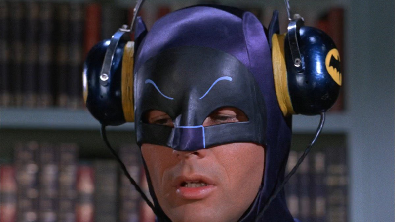 Batman just checking in on his playlists. (Screenshot: Warner Bros.)