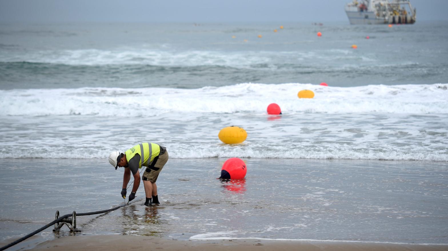 Laying an undersea cable in Spain, one of the 600,000-plus miles of fibre optic submarine cables. (Photo: ANDER GILLENEA/AFP via Getty Images, Getty Images)