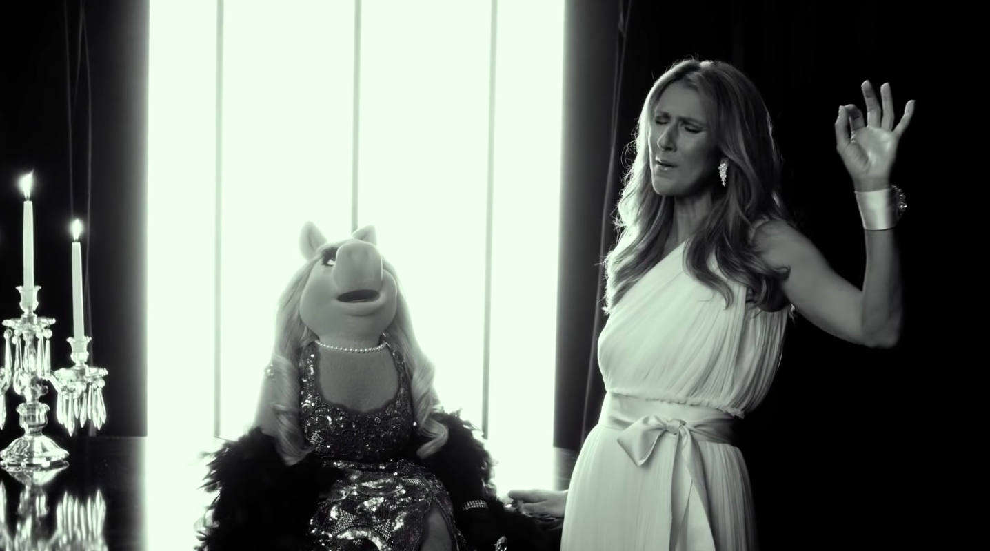 Miss Piggy and Celine sharing a moment. (Screenshot: Disney)
