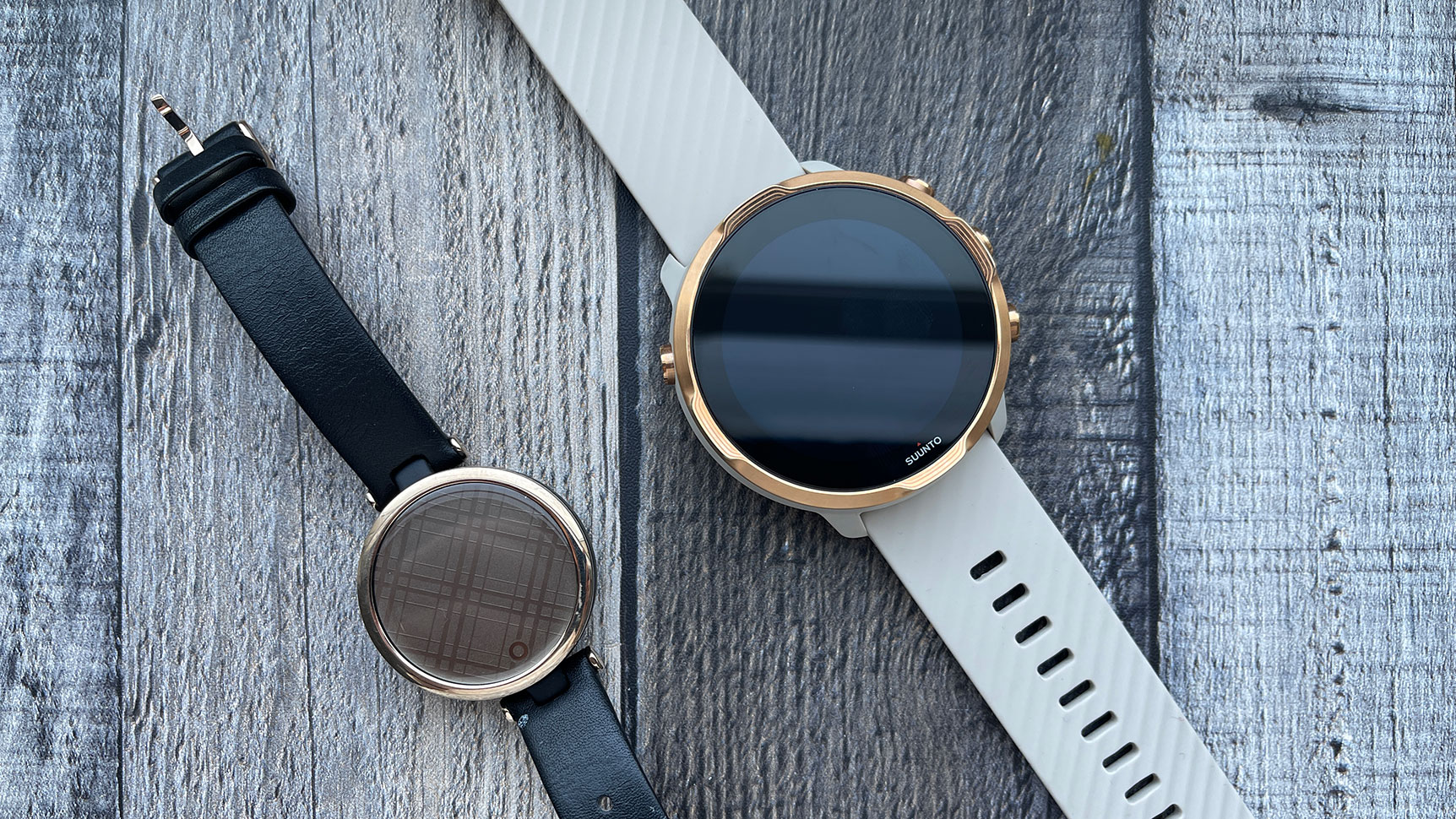The Garmin Lily is the smallest smartwatch I've tested. The Suunto 7 is the largest. Look at that massive size difference! (Photo: Victoria Song/Gizmodo)