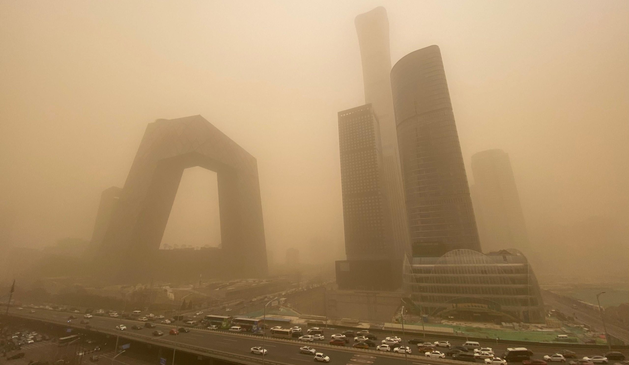 Buildings are seen in the central business district of Beijing during a sandstorm on March 15, 2021.  (Photo: Leo Ramirez, Getty Images)
