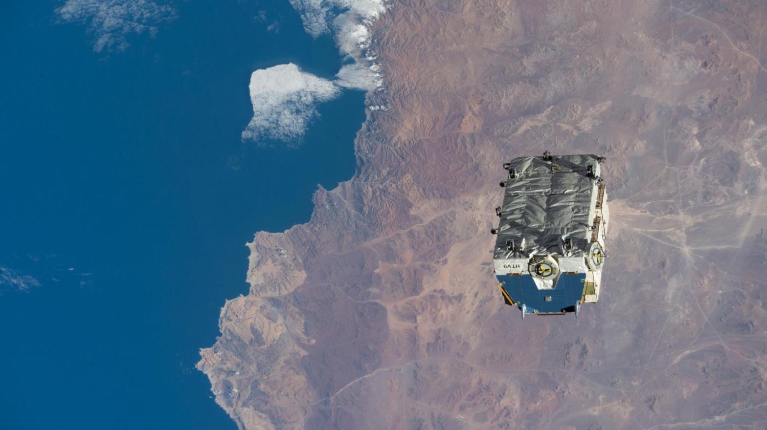 The external pallet packed with old nickel-hydrogen batteries, photographed shortly after being released by the Canadarm2 robotic arm. The object was orbiting 265 miles (427 km) above Chile when this photo was taken from the ISS.  (Image: NASA)