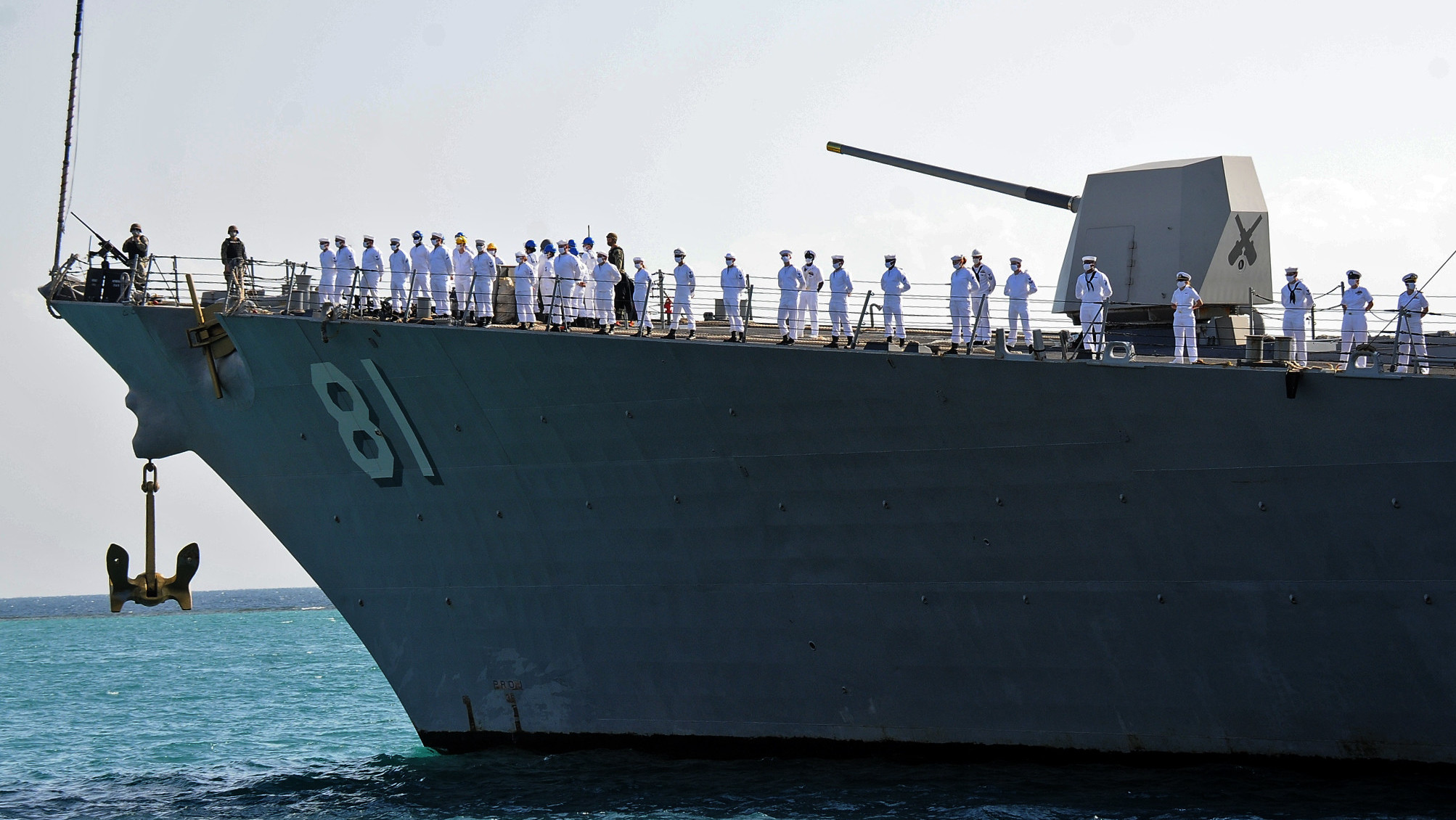 US sailors look on as they stand aboard the US Navy guided-missile destroyer USS Winston S. Churchill (DDG 81), part of Destroyer Squadron 2, while it anchors in Port Sudan on March 1, 2021.  (Photo: AFP, Getty Images)