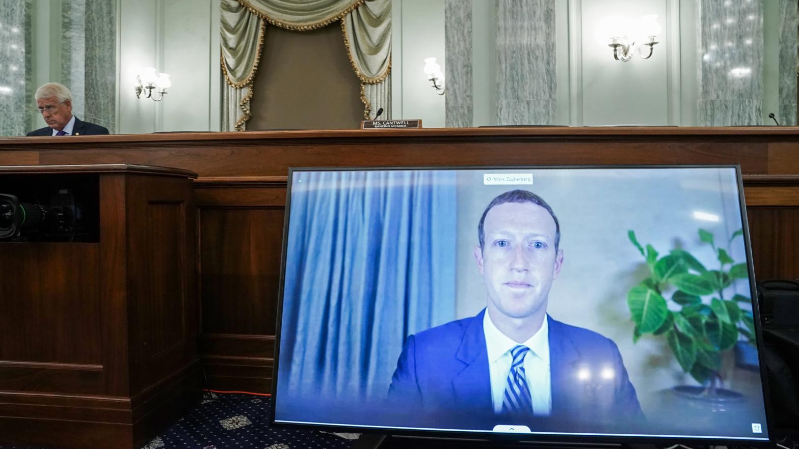 CEO of Facebook Mark Zuckerberg appears on a monitor as he testifies remotely during a hearing to discuss reforming Section 230 of the Communications Decency Act with big tech companies on October 28, 2020 in Washington, DC. (Photo: Michael Reynolds, Getty Images)