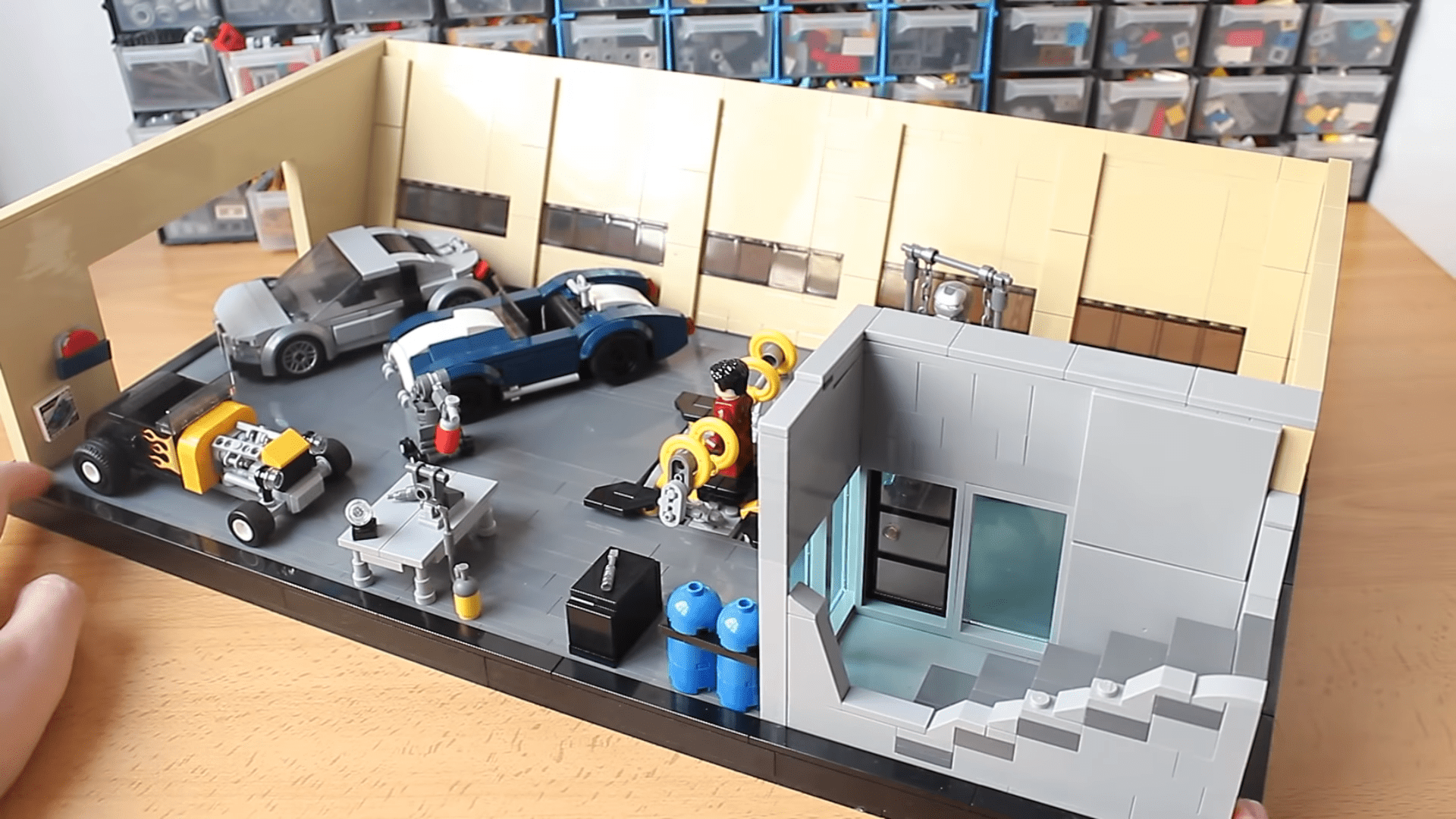 This Fan-Made LEGO Iron Man Garage Has Some Great Models Of The Audi R8 And AC Cobra