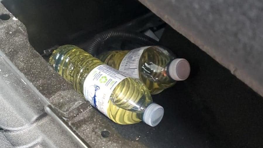 Photo: Photo of urine-filled bottles allegedly discovered by a driver in the back of an Amazon delivery van