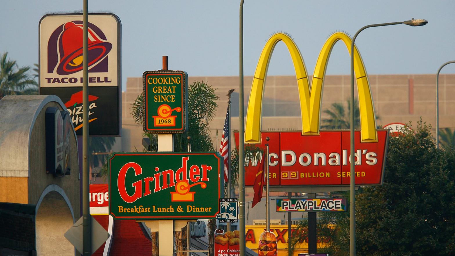 Signs for Taco Bell, Grinder, McDonalds, Panda Express fast-food restaurant line the streets in the Figueroa Corridor area of South Los Angeles on July 24, 2008, Los Angeles, California.  (Photo: David McNew, Getty Images)