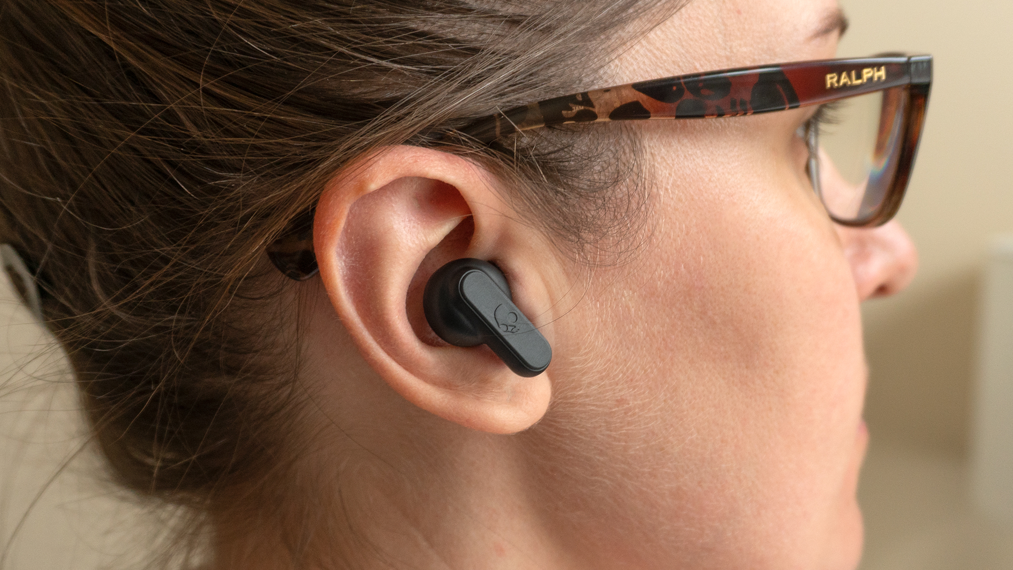 The design of the Skullcandy Dime allows them to nestle into your ear, and because they're lightweight, they're also very comfortable to wear. (Photo: Andrew Liszewski/Gizmodo)