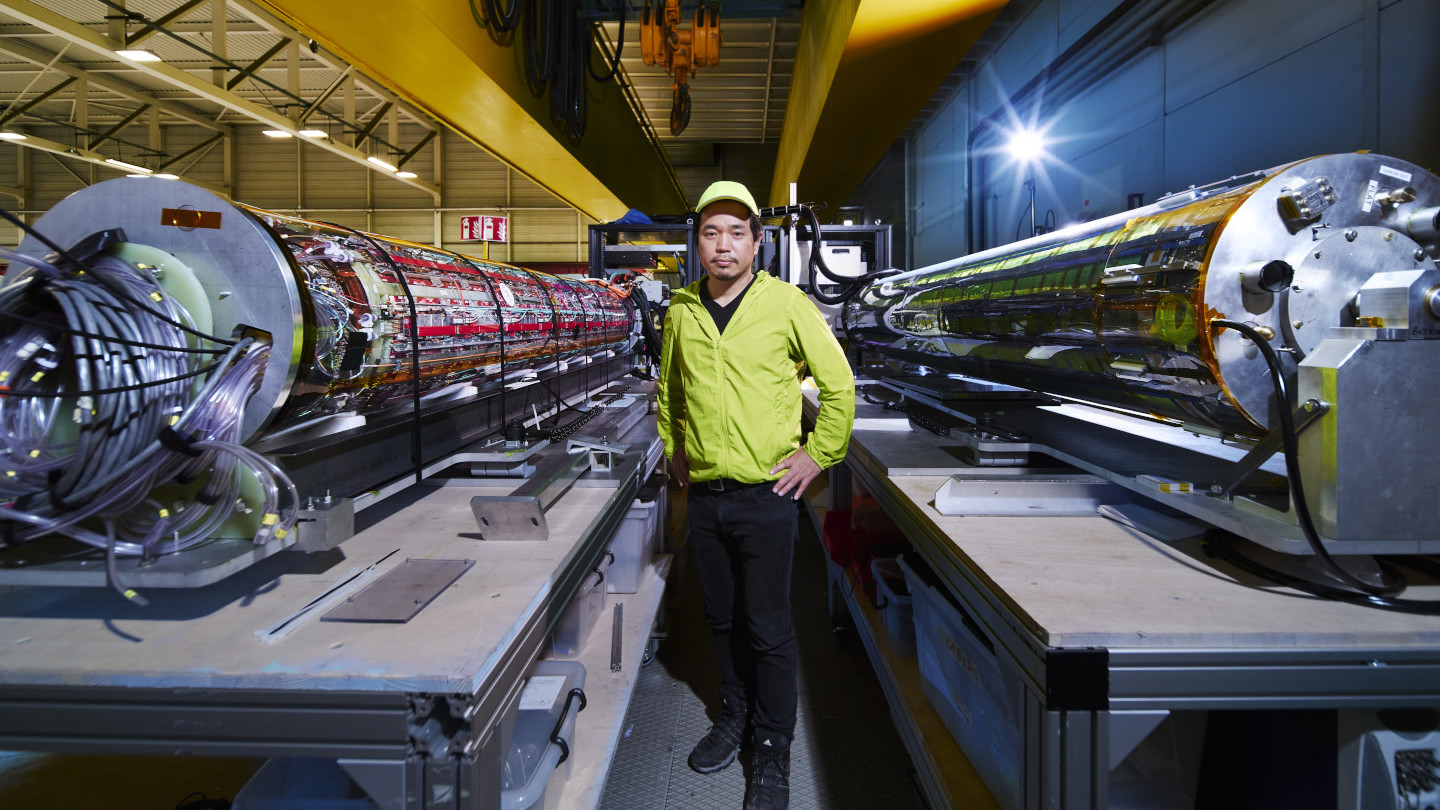 Makoto Fujiwara with CERN's ALPHA Experiment apparatus. (Photo: Maximilien Brice)