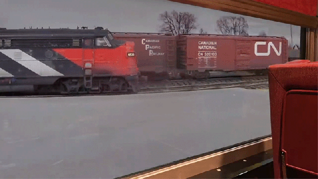 A Tiny Video Camera Lets This Train Enthusiast Ride Along on His Incredibly Detailed Model Railroad