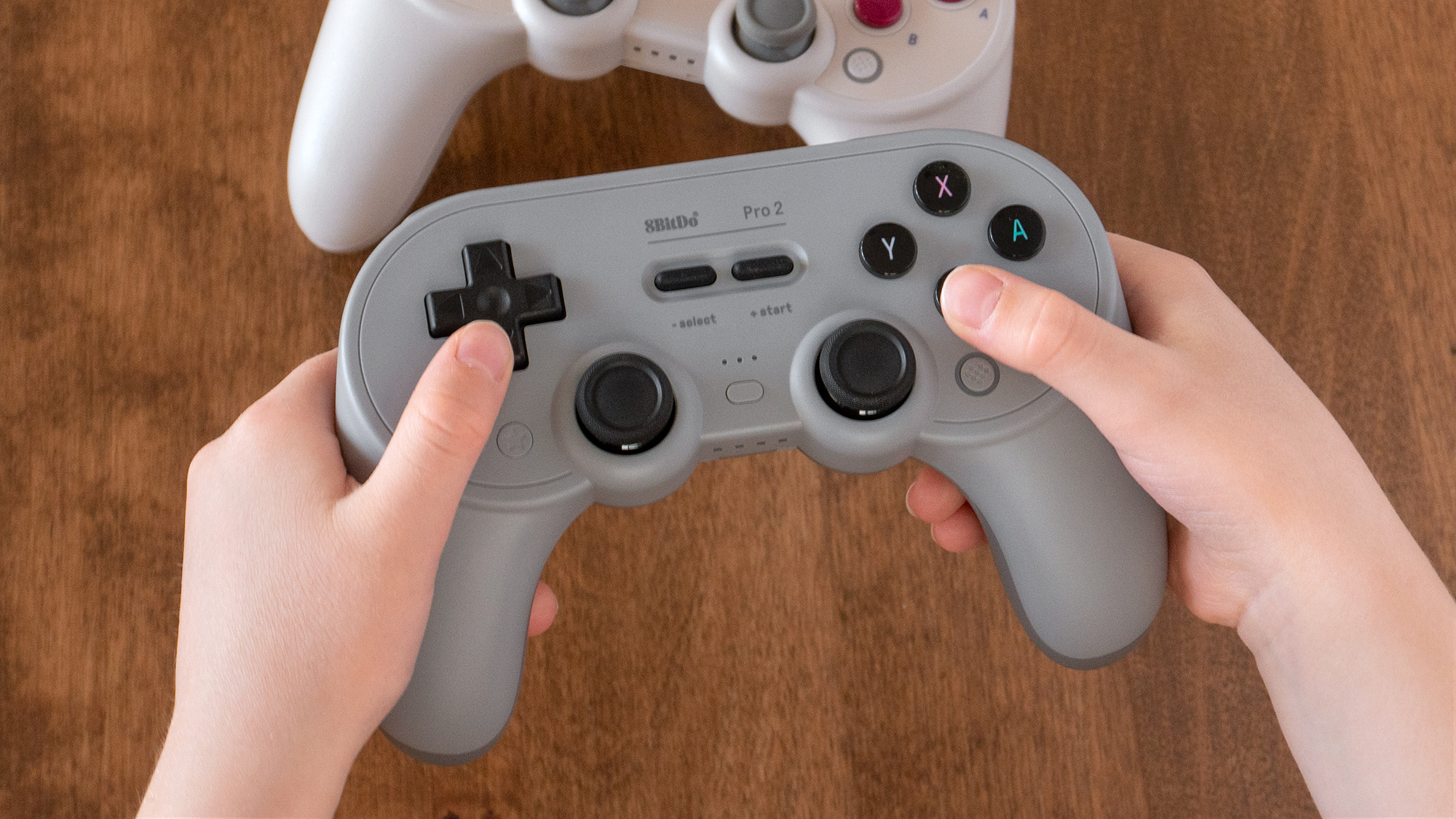 At $US50 ($66), the new 8BitDo Pro 2 is priced exactly the same as its predecessor. But even if you find the SN30 Pro+ discounted as a result, don't buy it — the upgraded functionality of the Pro 2 is worth the extra cost. (Photo: Andrew Liszewski/Gizmodo)