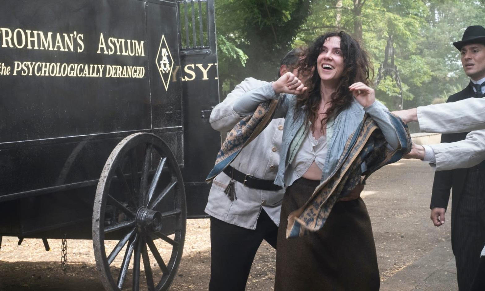 Maladie (Amy Manson) witnesses something incredible while being hauled away on The Nevers. (Photo: Keith Bernstein/HBO)