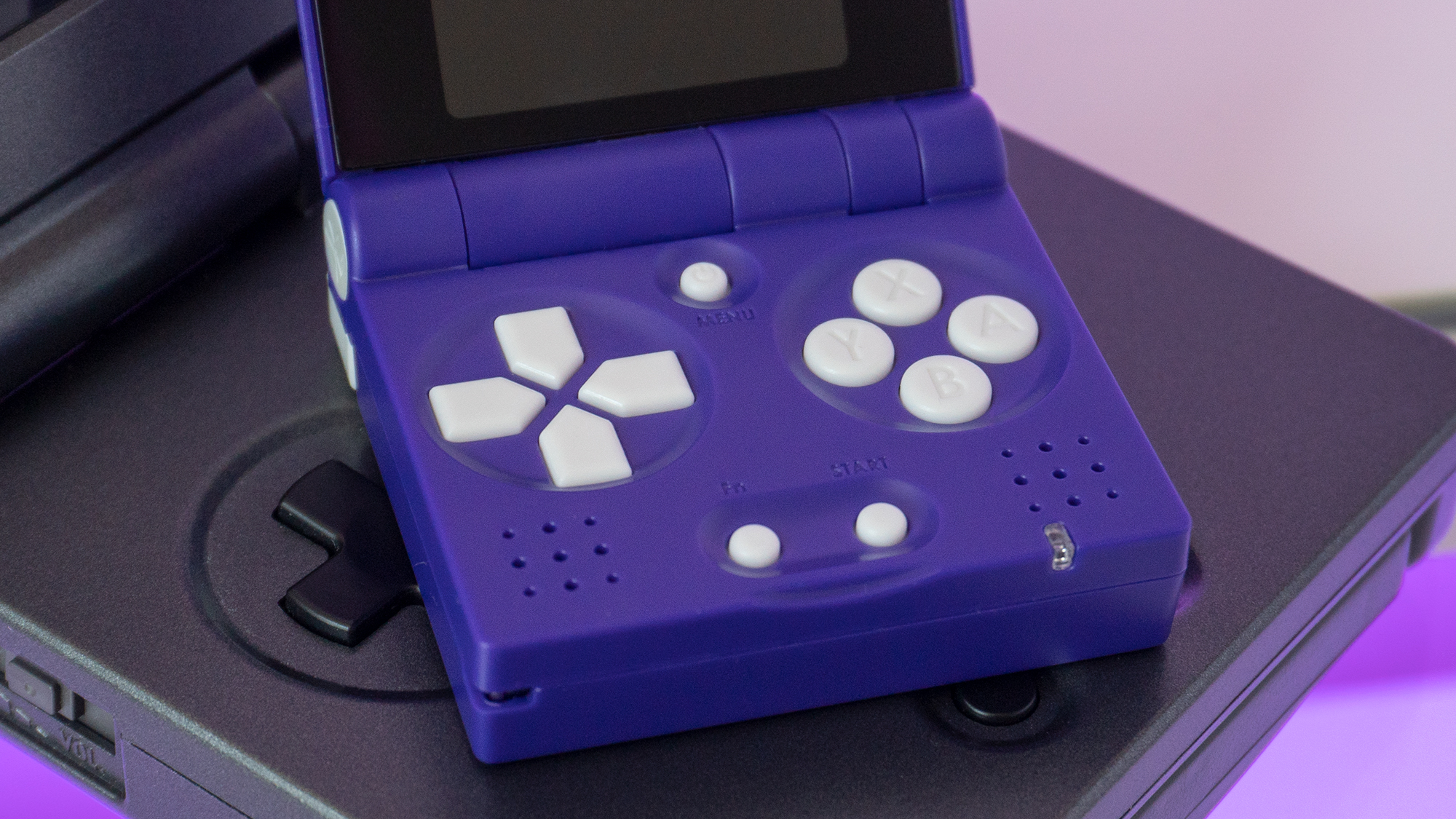 It's small, but the FunKey S still manages to include all the buttons you'll need for a host of different consoles. (Photo: Andrew Liszewski/Gizmodo)