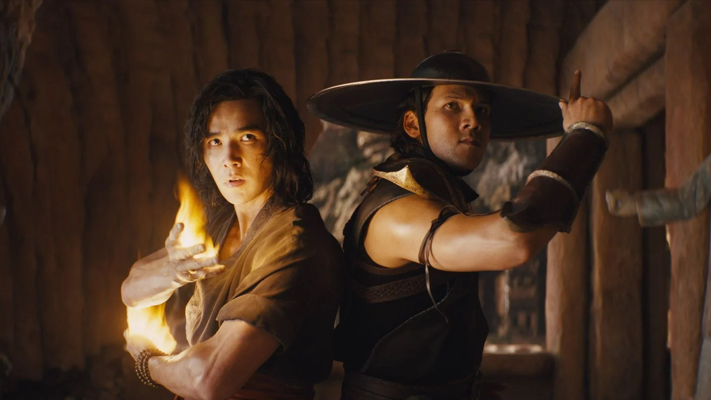 Liu Kang (Ludi Lin) and Kung Lao (Max Huang) TEST. THEIR. MIGHT. (Image: Warner Bros.)