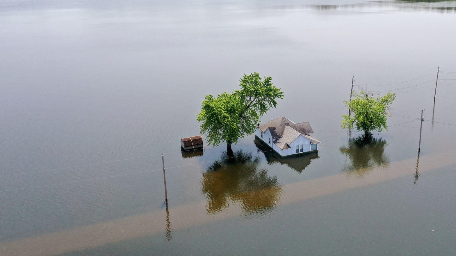 Floodwaters from the Mississippi River rise around a home on June 1, 2019 in West Alton, Missouri. (Photo: Scott Olson, Getty Images)