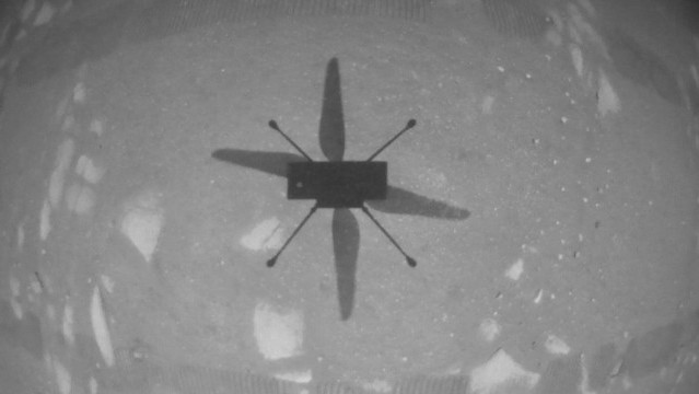 Ingenuity's shadow on Mars, imaged by the hovering helicopter. (Image: NASA/JPL-Caltech, Fair Use)