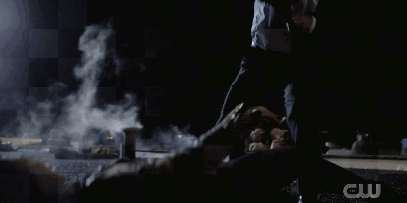 Nicky fighting some dude. (Gif: The CW)