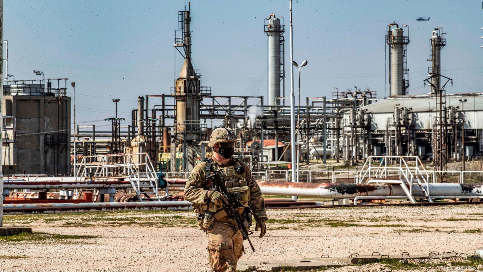 A U.S. infantryman stationed near the Suwaydiyah oil fields in Syria in February 2021. (Photo: Delil Souleiman/AFP, Getty Images)