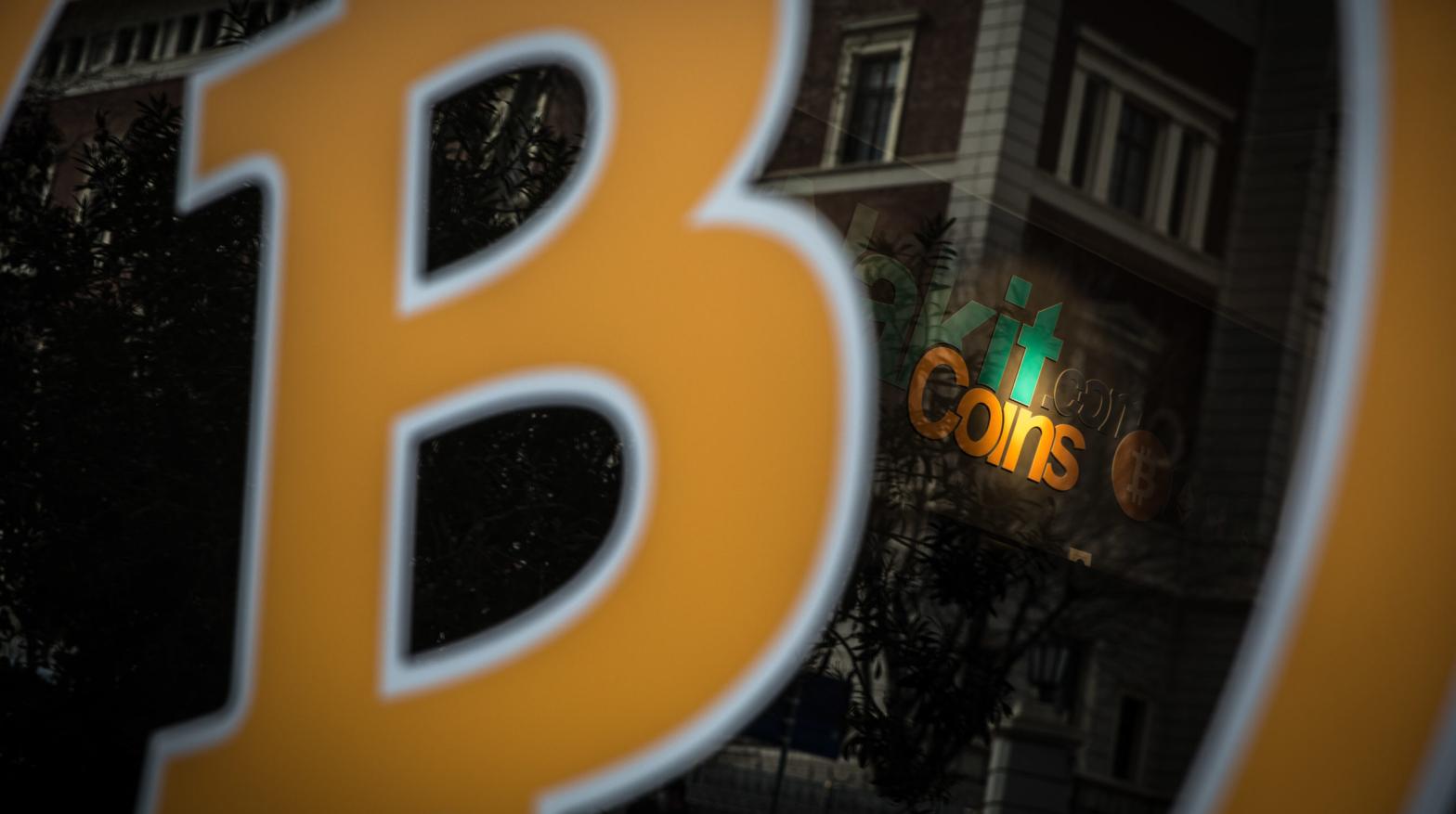 A Bitcoin sign is seen at the entrance of a cryptocurrency exchange office on April 16, 2021 in Istanbul, Turkey. (Photo: Chris McGrath, Getty Images)