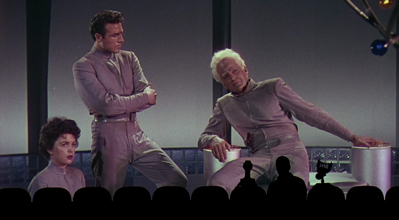 Mike and the 'Bots watch This Island Earth for Mystery Science Theatre 3000: The Movie. (Image: Universal/Shout Factory)