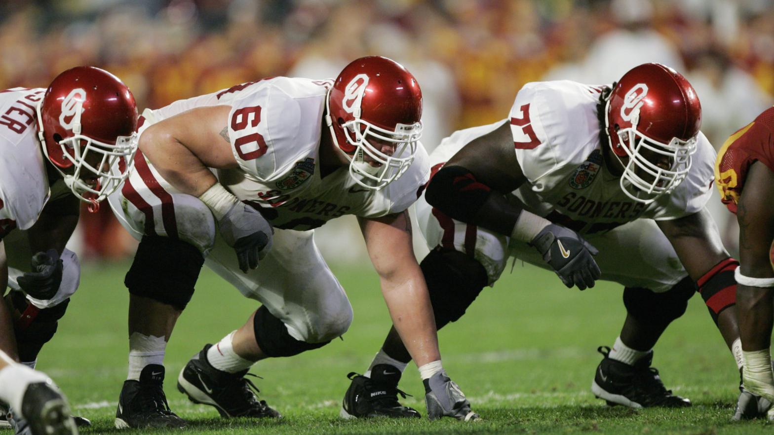 Members of the Oklahoma Sooners line up against the USC Trojans in the 2005 FedEx Orange Bowl National Championship on January 4, 2005 at Pro Player Stadium in Miami, Florida (Photo: Brian Bahr, Getty Images)