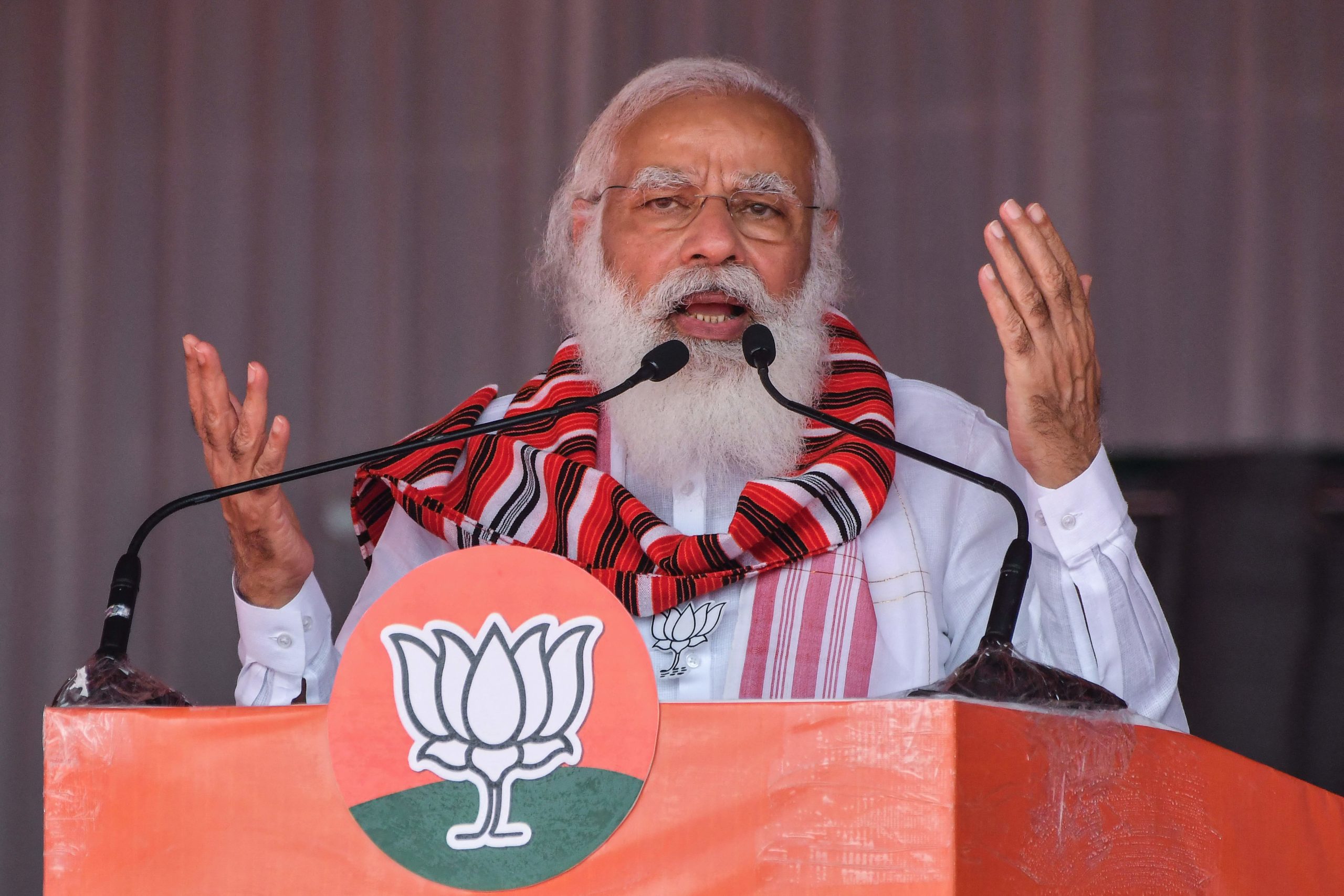 India's Prime Minister Narendra Modi gestures as he addresses a public meeting ahead of Assam Assembly elections, in Bokakhat on March 21, 2021.  (Photo: Biju Boro/AFP, Getty Images)