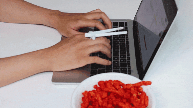 These Finger-Worn Chopsticks Are the Best Thing to Happen to Snacking Since Doritos