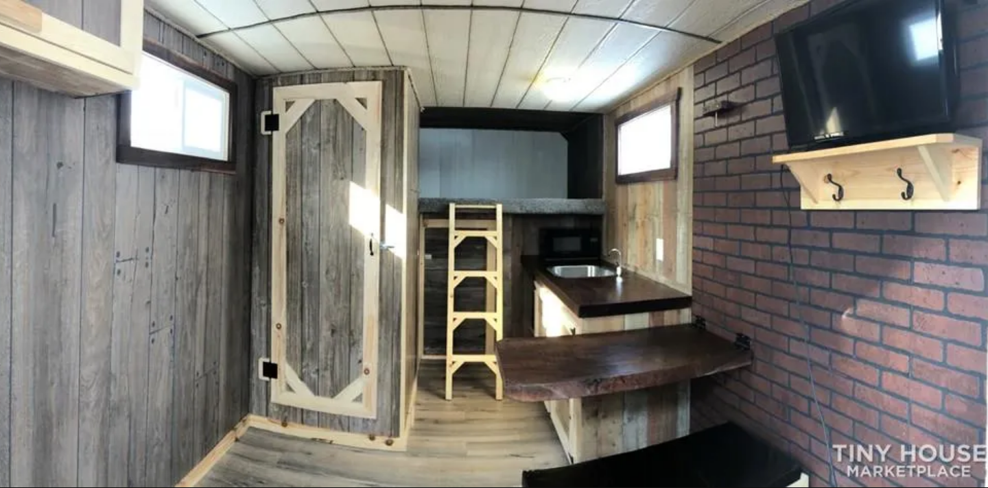 Someone Built A Cozy Cabin Of A Tiny House Out Of A U-Haul Truck