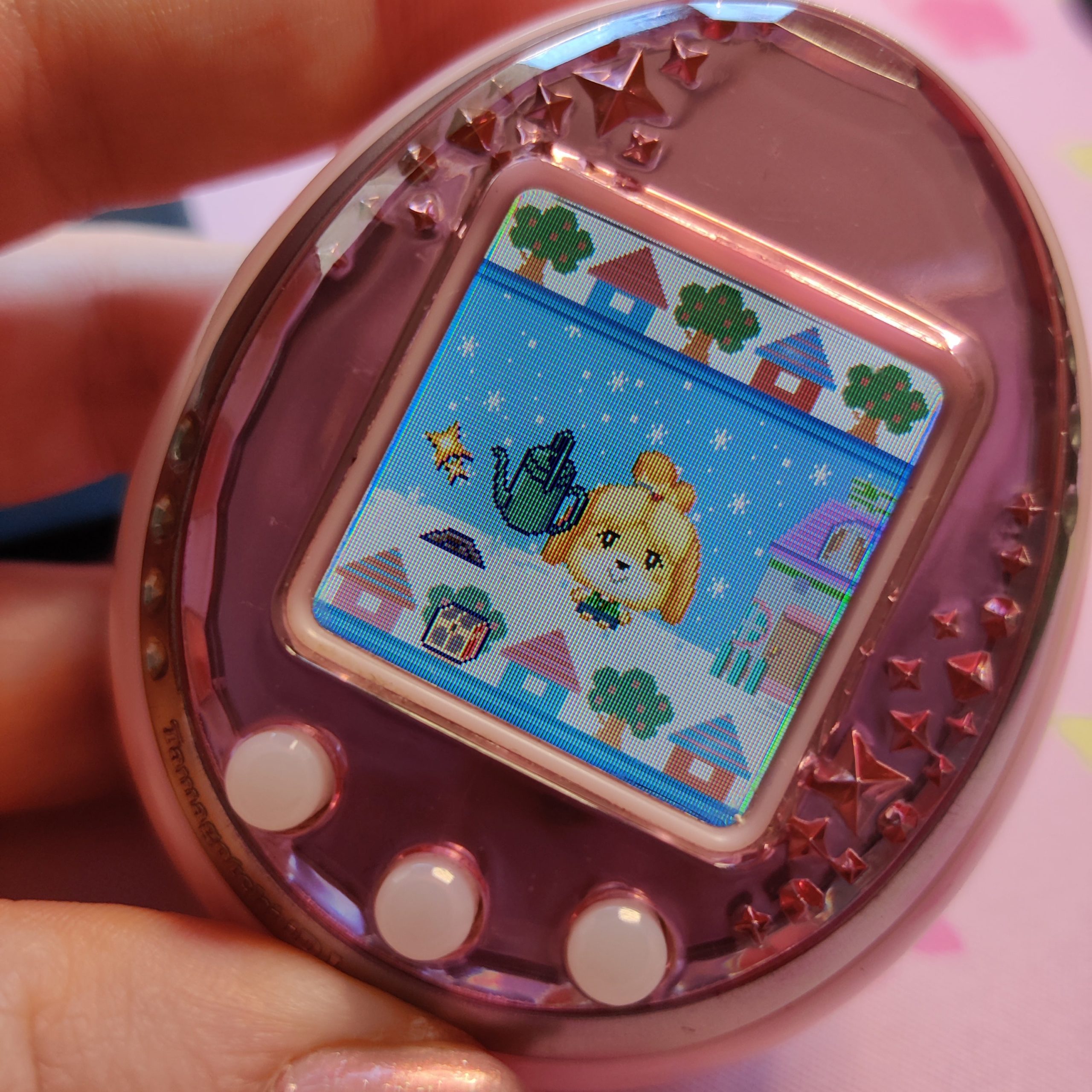 That one time I turned a Tamagotchi into Isabelle from Animal Crossing. Pixel artist is annatchi3 on Instagram. (Photo: Florence Ion/Gizmodo)