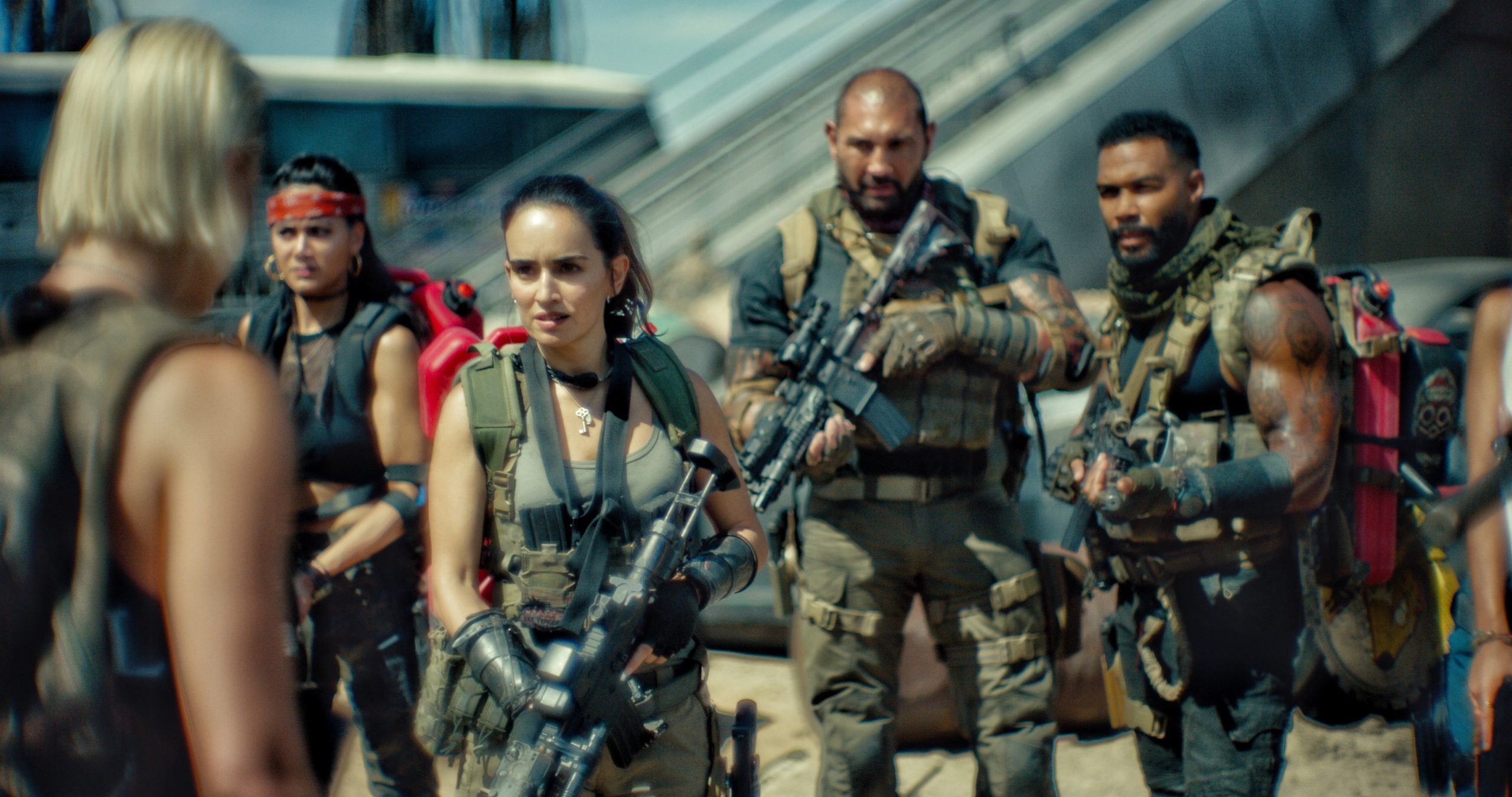 The humans preparing to venture deeper into zombie territory. (Image: Netflix)