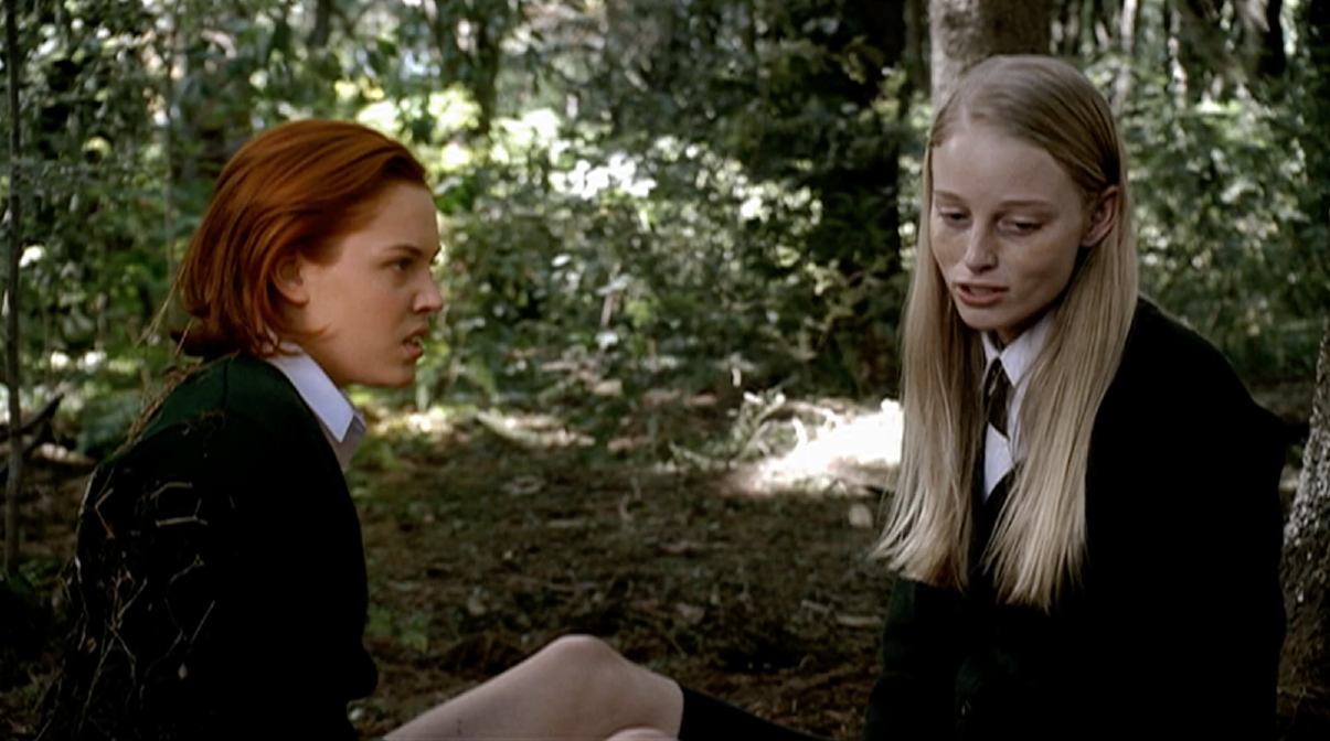 The New Girl (Agnes Bruckner) and the Mean Girl (Rachel Nichols) in The Woods. (Screenshot: Sony)