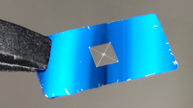 If We Live in a Sea of Dark Matter, This Tiny Mirror Might Be Able to Detect It