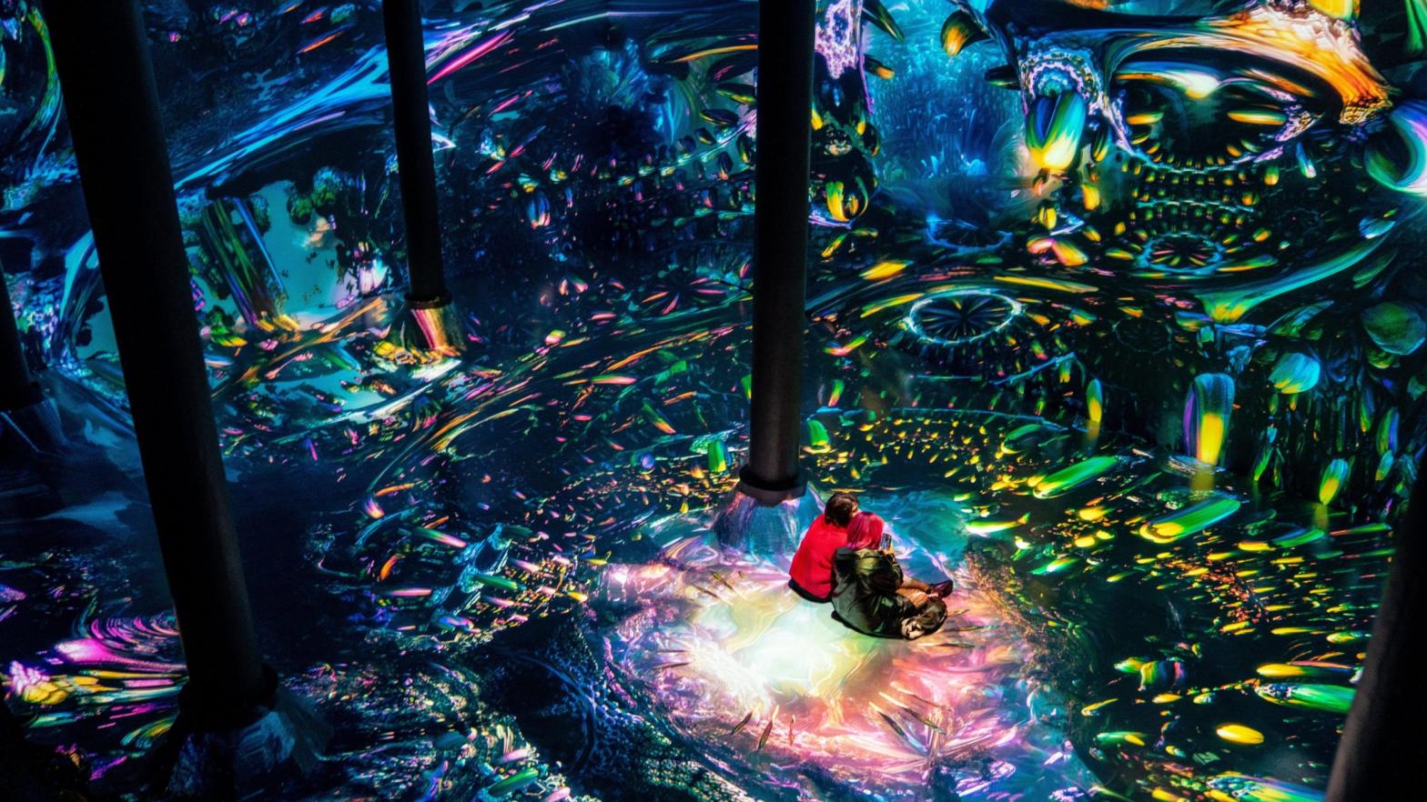 Two people sit in an immersive art installation by Julius Horsthuis on March 5, 2021 in New York City. (Photo: David Dee Delgado, Getty Images)
