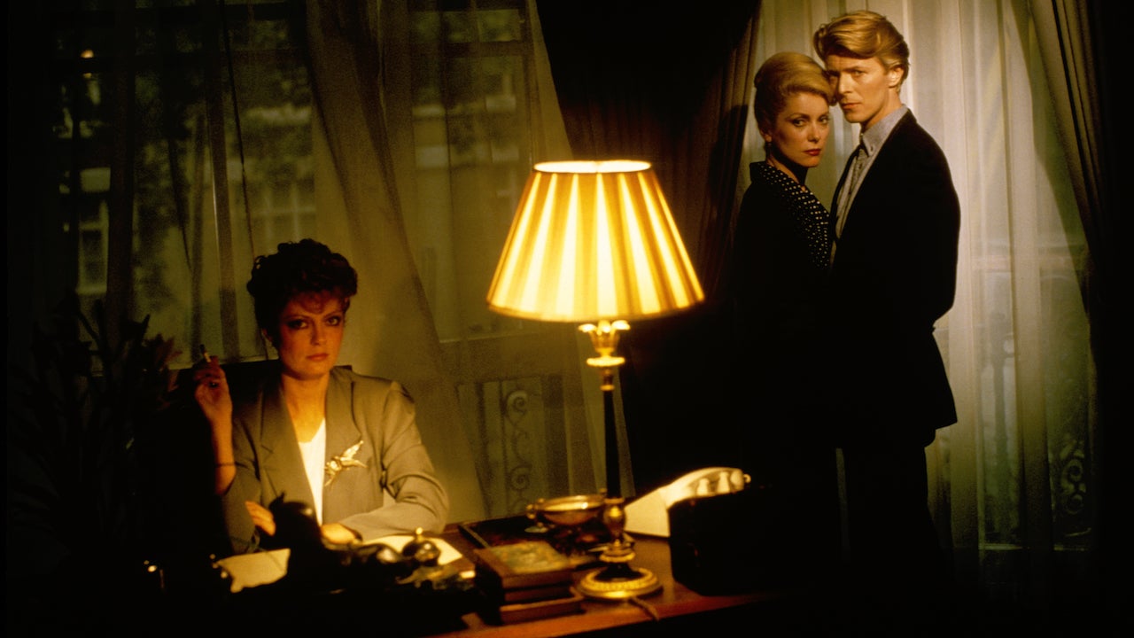 Susan Sarandon, Catherine Deneuve, and David Bowie in The Hunger. (Image: Warner Bros.)