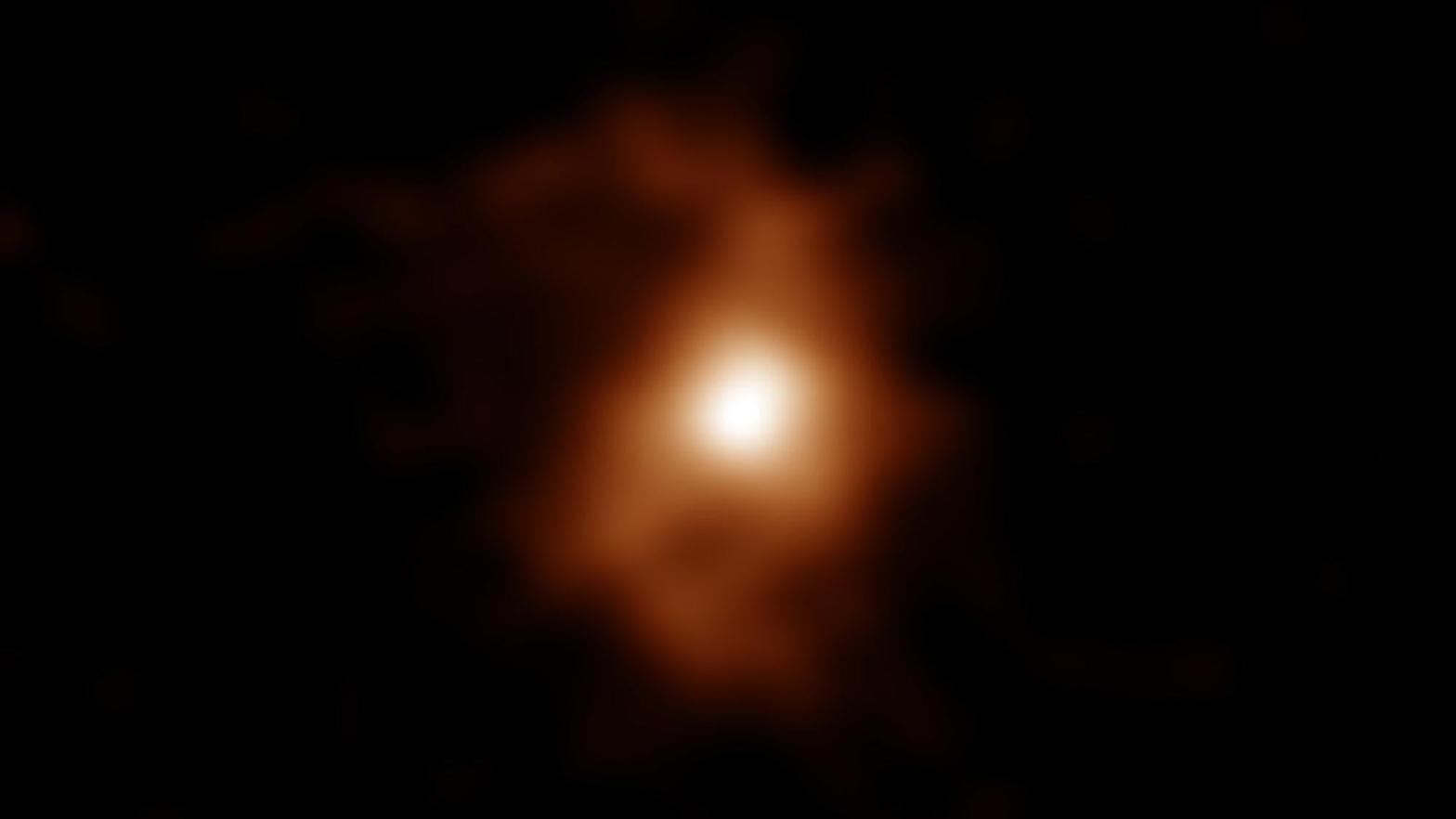 BRI1335-0417, an early galaxy with spiral arm structures. (Image: ALMA (ESO/NAOJ/NRAO), T. Tsukui & S. Iguchi)
