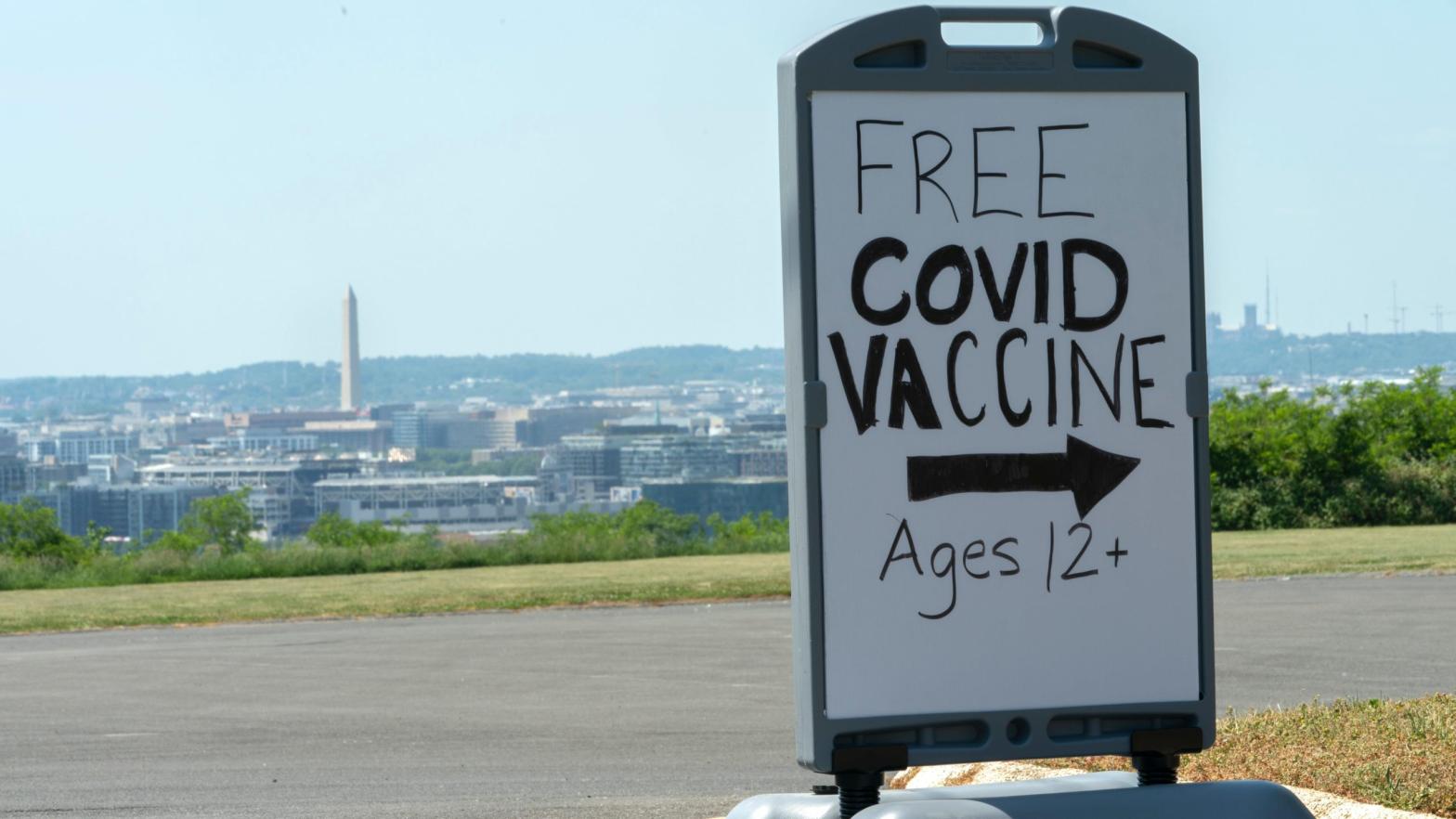 A sign advertising a free vaccine drive at a clinic held on May 19 outside the Washington School for Girls in southeast Washington.  (Photo: Jacquelyn Martin, AP)