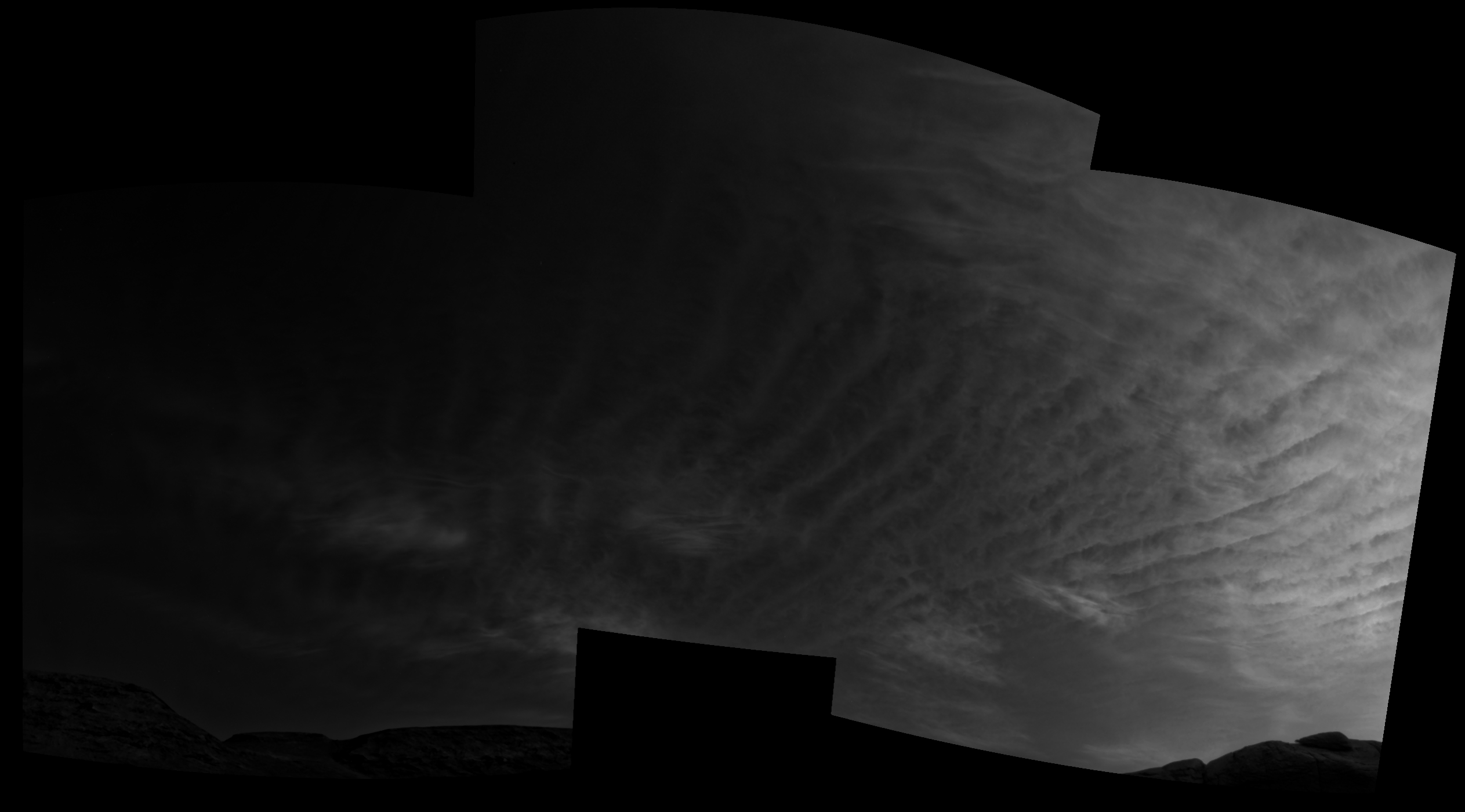 Using the navigation cameras on its mast, NASA's Curiosity Mars rover took these images of clouds just after sunset on March 31, 2021, the 3,075th sol, or Martian day, of the mission. (Gif: NASA/JPL-Caltech)